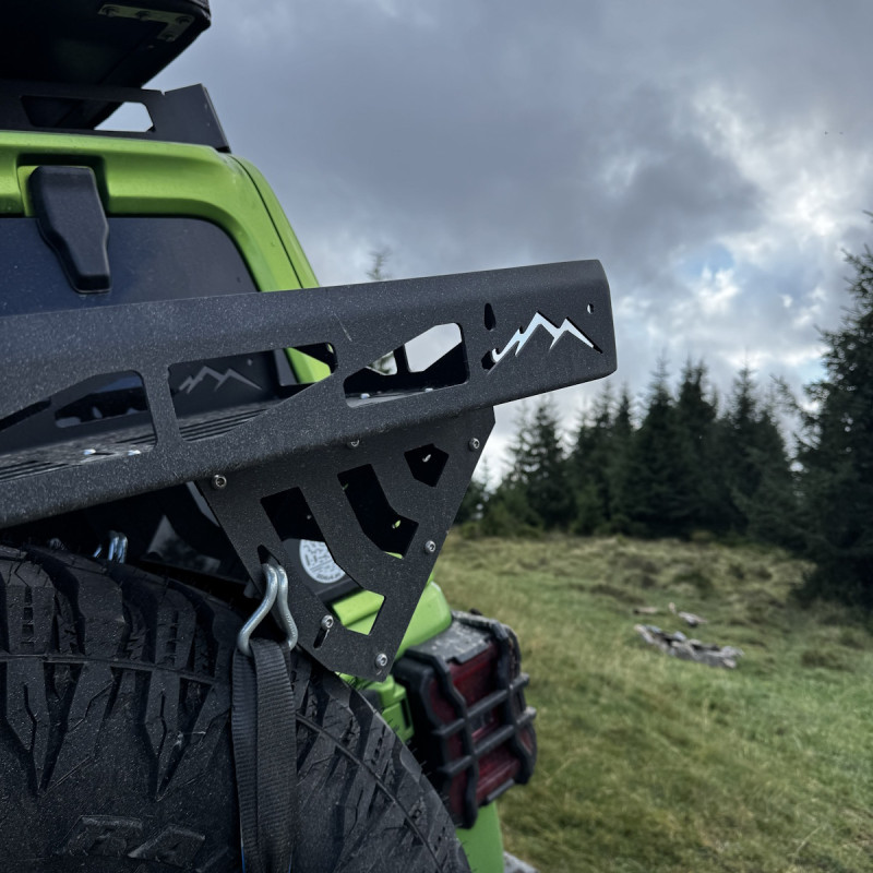 Offroad-Mania rear cargo tray mounted on spare tire of an off-road vehicle