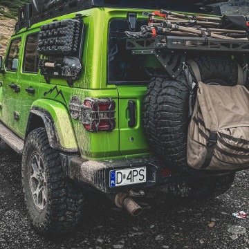 Offroad-Mania rear cargo tray mounted on spare tire of an off-road vehicle
